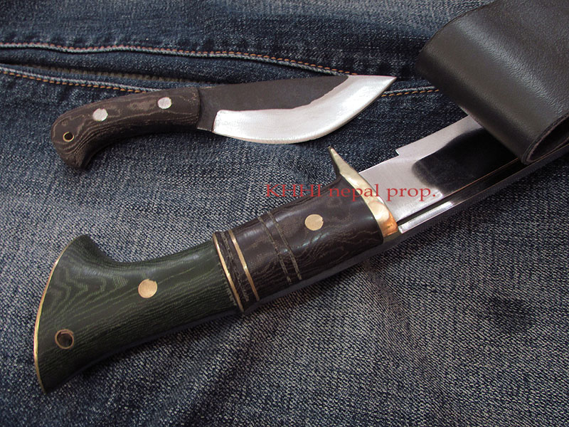kukri with curved micarta handle for easier handling
