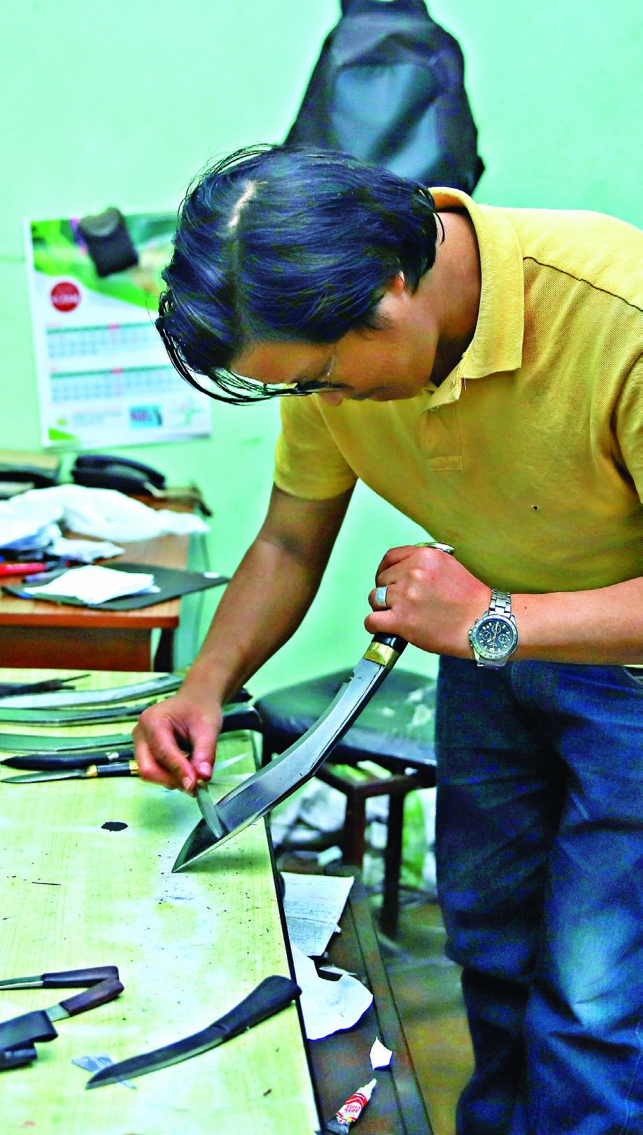 polishing and sharpening khukuri